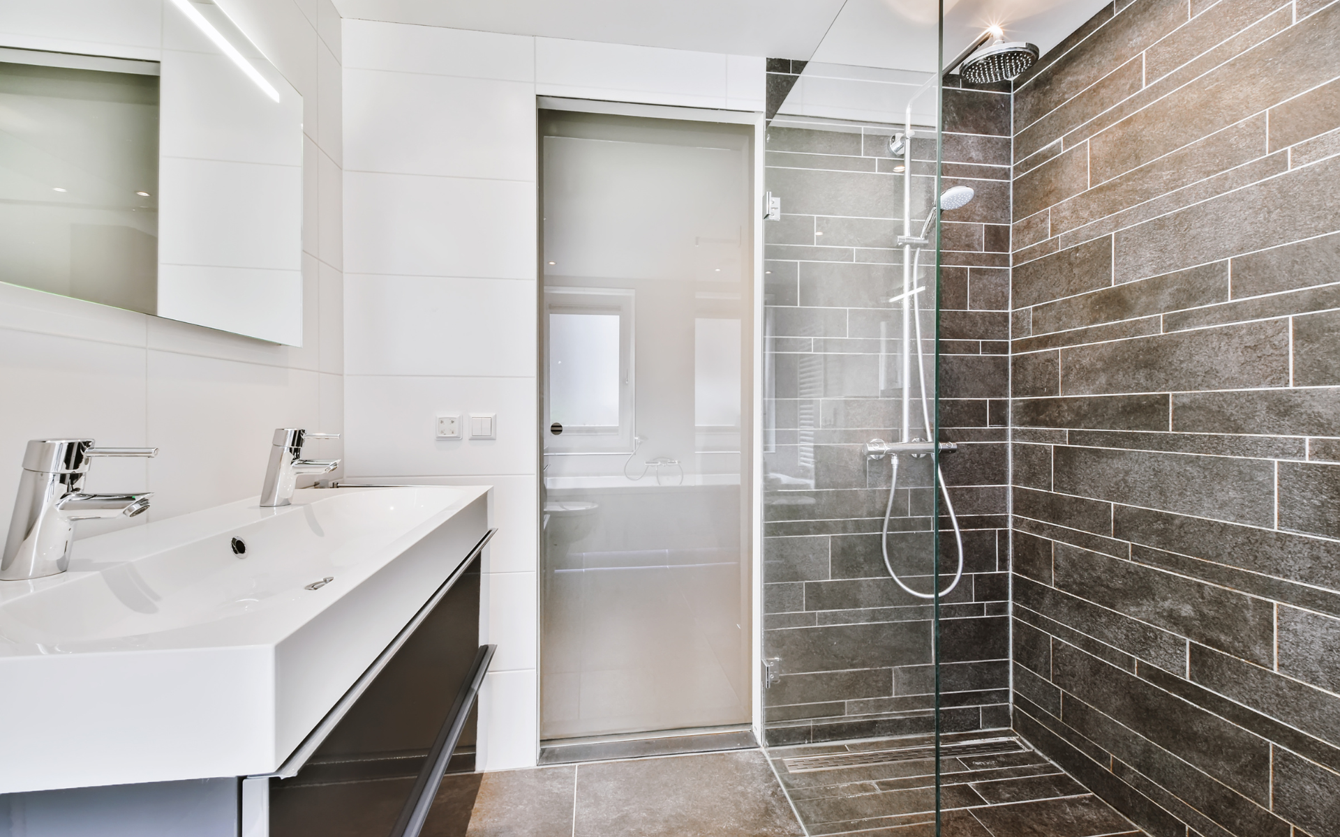 Elegant bathroom with glass wall doorless shower