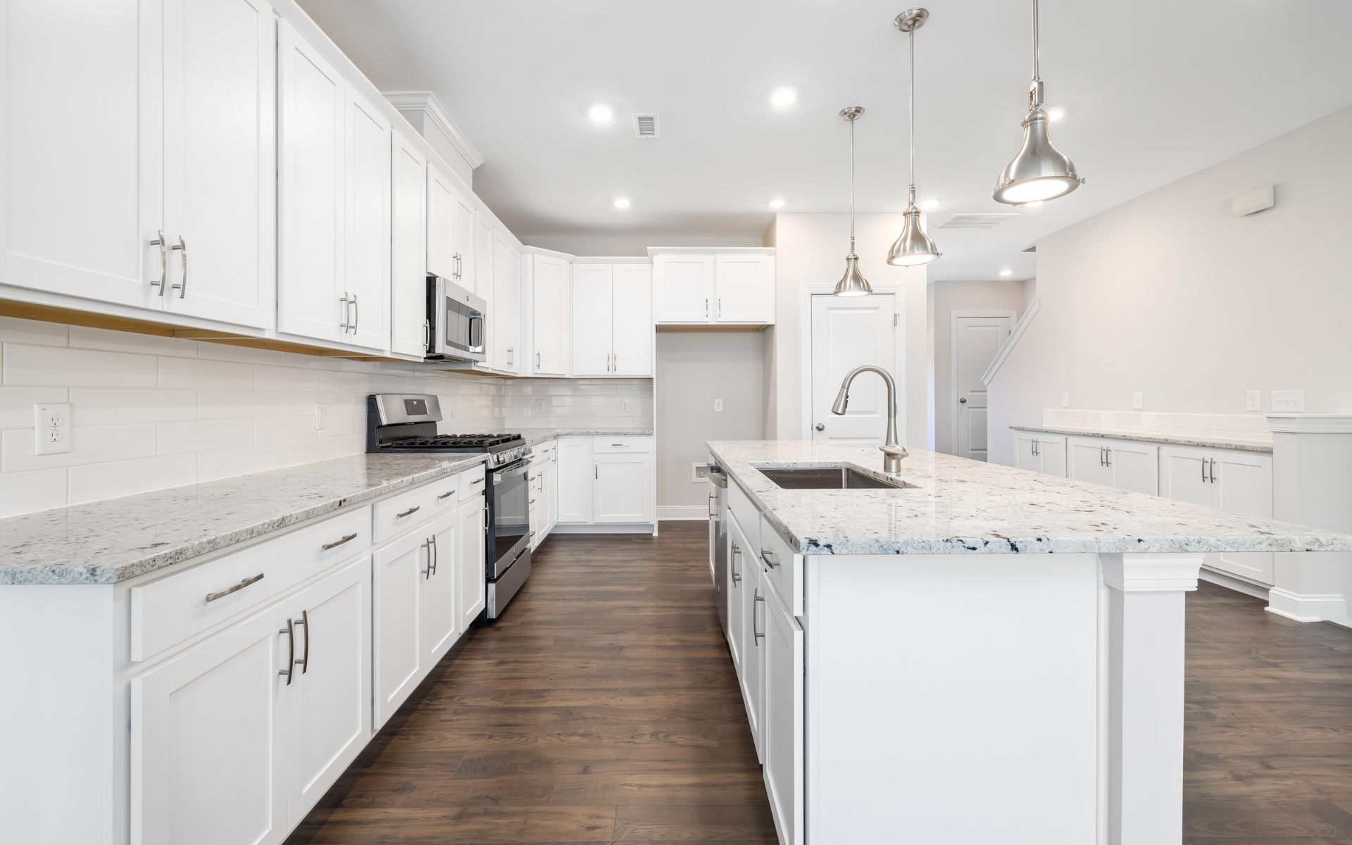 Bright white kitchen with shaker cabinets