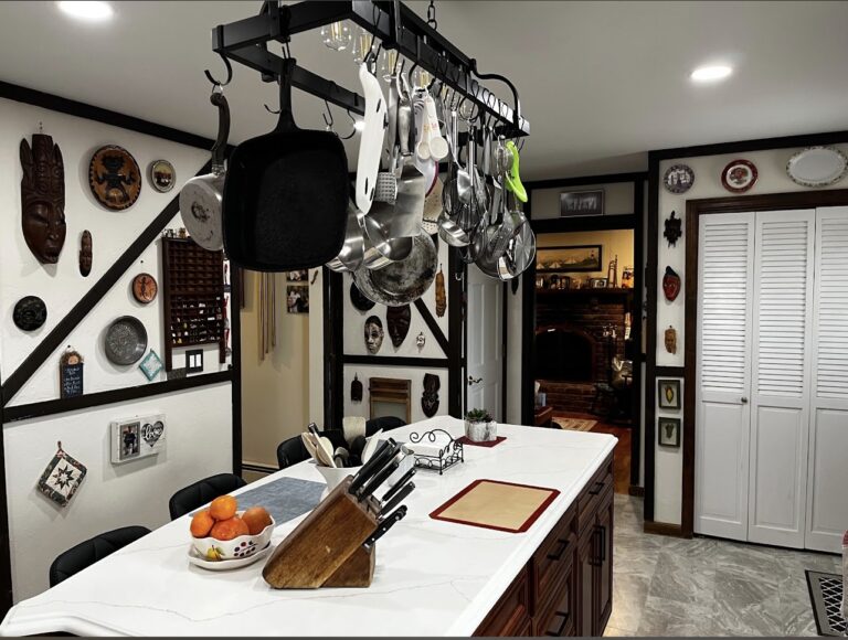 Traditional kitchen with brown cabinets and white countertops
