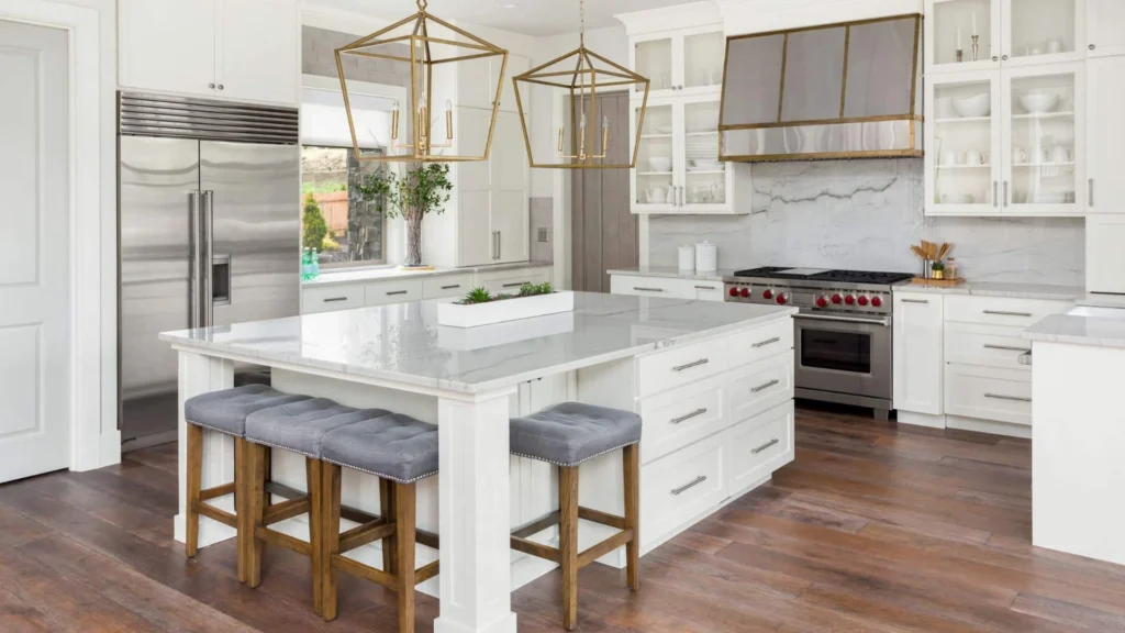 Gold deal white kitchen design with quartz countertop