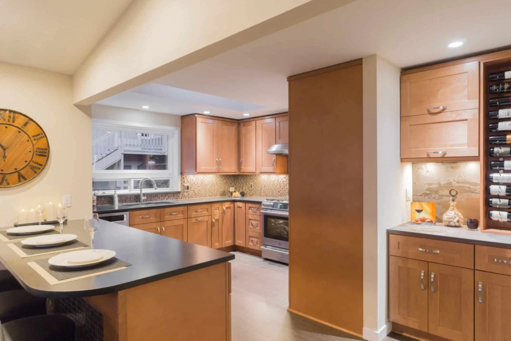 J&K wood kitchen cabinets with black countertops