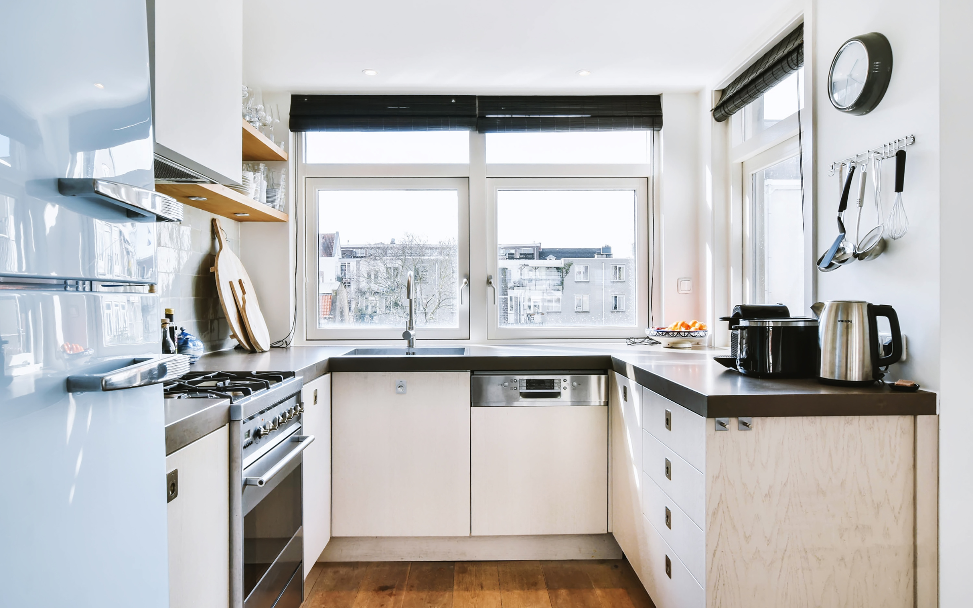 Small kitchen with white cabinets