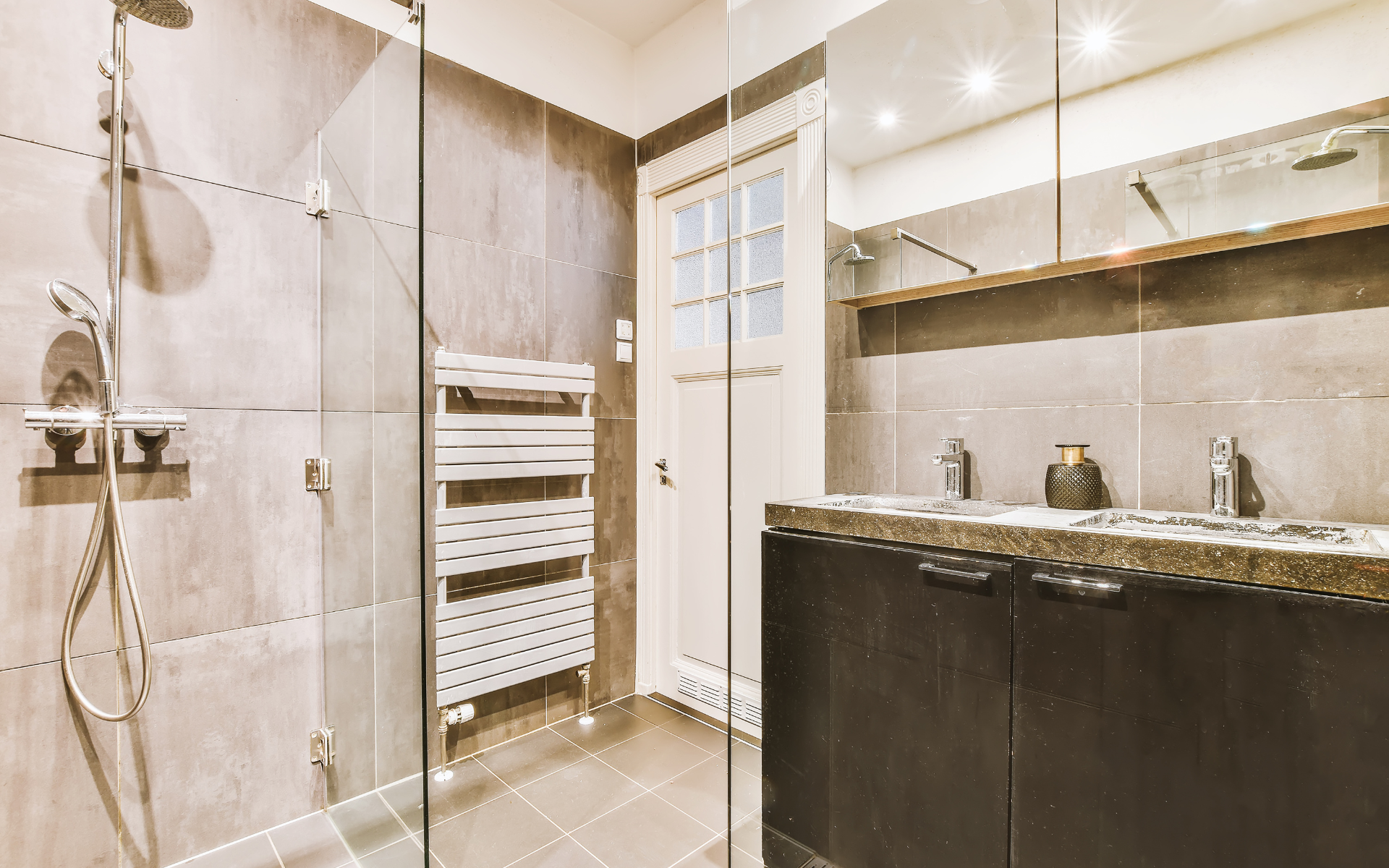 Beige small bathroom remodel with vanity and shower