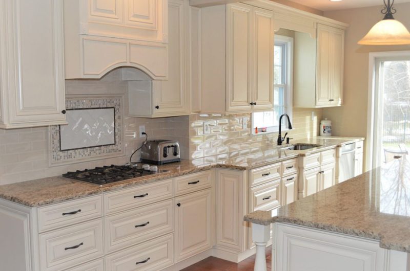 Spacious cream kitchen design with beige countertop
