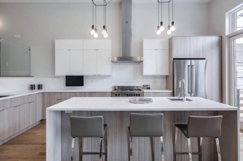 Adornus Kitchen design in light grey cabinet and white countertop