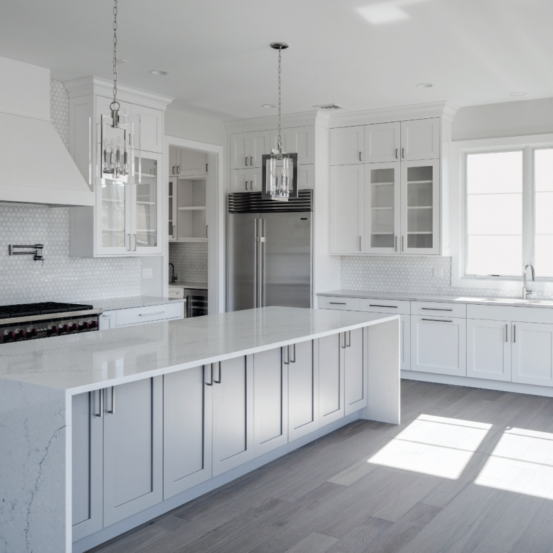 St. Martin White Modern kitchen cabinets with white luxury countertops